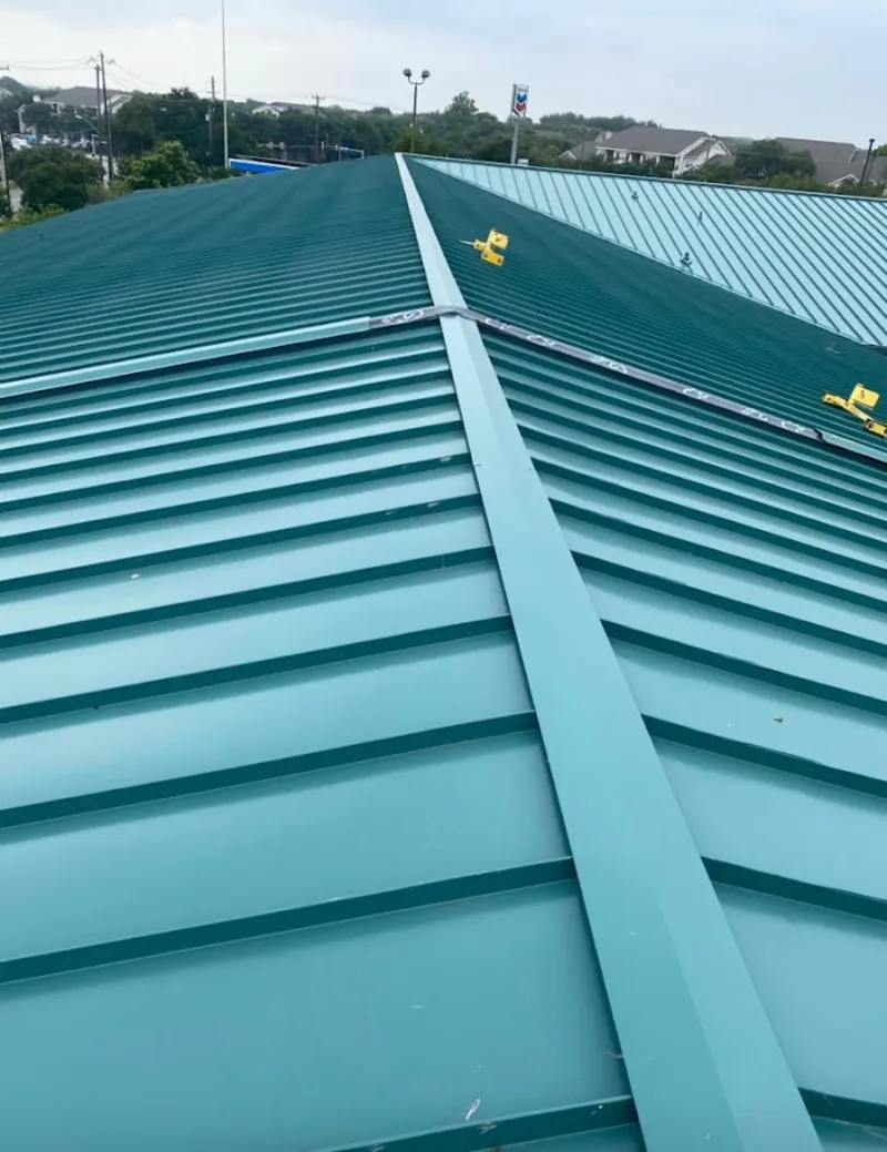 Green commercial metal roof ridge and valley for Metal Roof Repair in Grapevine