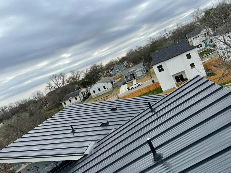 Standing seam metal roof panels with vents for Skylight Repair in Grapevine